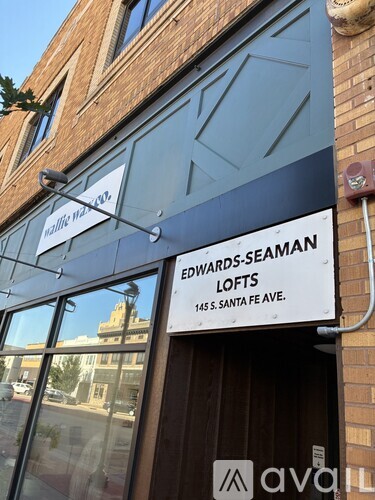 A sign for Edwards-Seaman Lofts is hanging on a building.