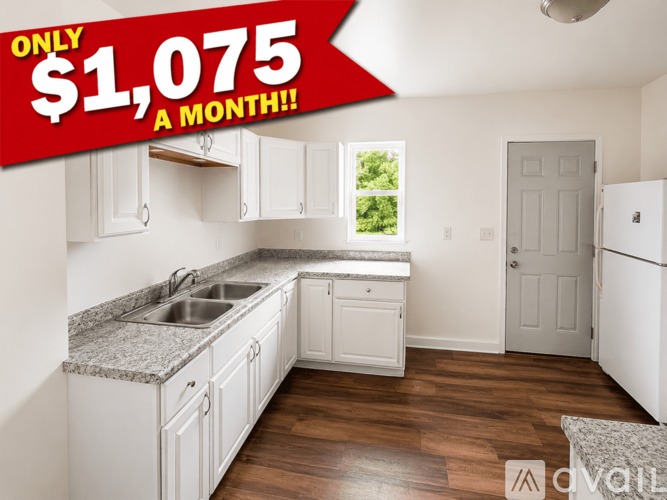 A kitchen with a price tag of $1,075 a month.