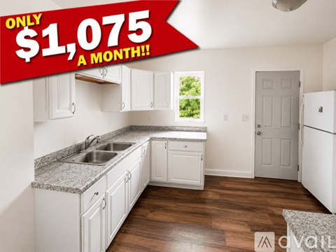 A kitchen with a price tag of $1,075 a month.