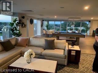 A living room with a large couch and a coffee table.