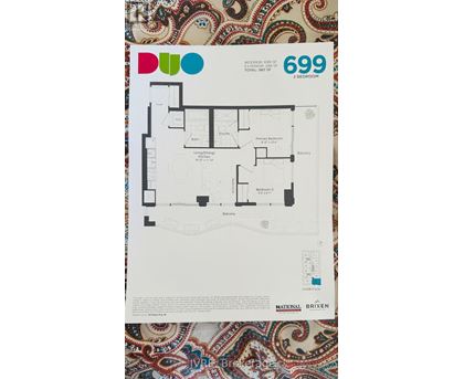 A floor plan for a residence numbered 699 is displayed.