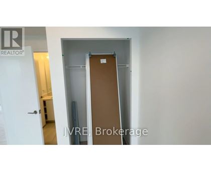 A room with a door and a sign that says "REALTOR".
