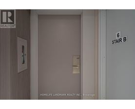 A door with a sign that says 6 stair b on the wall.