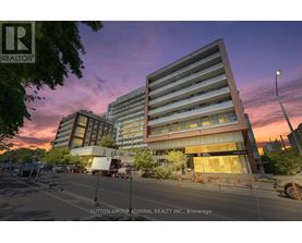 A large building with a sign that says "REALTOR" on it.