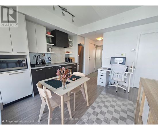 A modern kitchen with a dining table and chairs.
