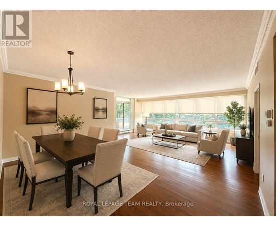A well-lit dining room with a table set for six.
