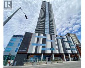 A tall building with the number 60 on it.