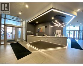A reception area with a desk and a sign that says REALTOR.