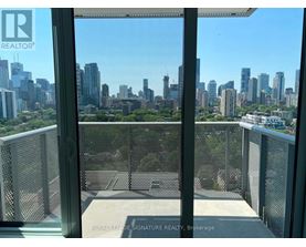 A balcony with a view of a city skyline.