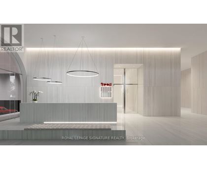 A modern realtor office with a reception desk and a red car parked outside.
