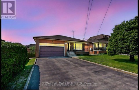A house with a garage is shown in the image.