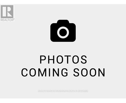 A placeholder image with a camera icon and the text "Photos Coming Soon".