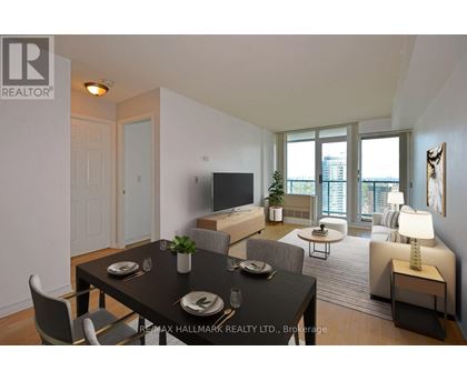 A well-lit, modern dining room with a table set for two and a view of the city.