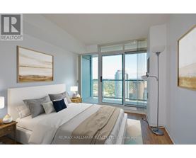 A bedroom with a large bed and a view of the city.