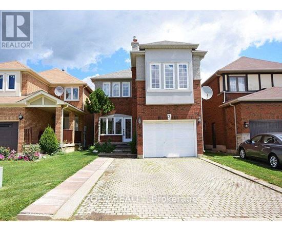 A house with a brick facade and a white garage door is for sale.