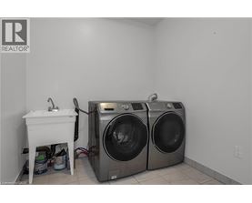 A laundry room with a washer and dryer.