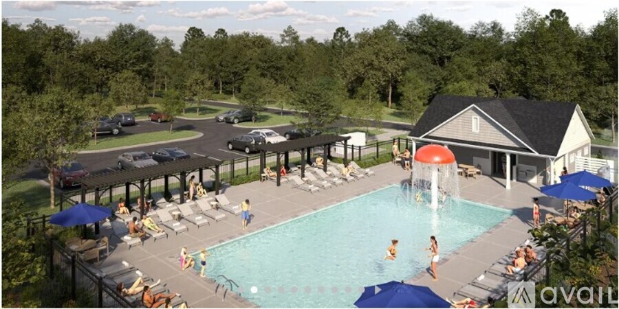 A group of people are enjoying the outdoor pool area.