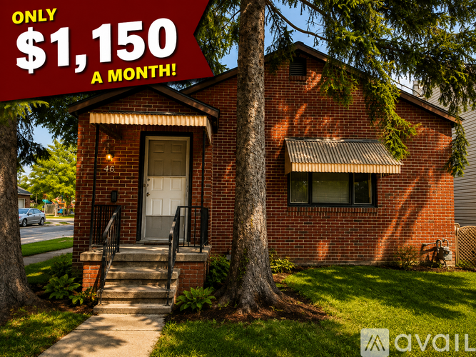 A house with a red brick exterior and a white door is for rent at $1,150 a month.