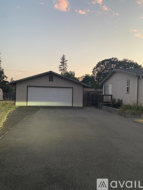 A two-car garage is situated in a residential area.