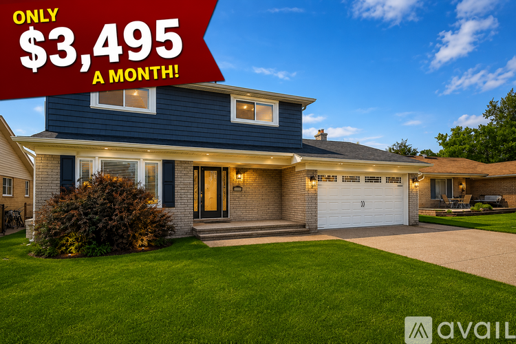 A house with a red banner stating "$3,495 A MONTH!" is for sale.