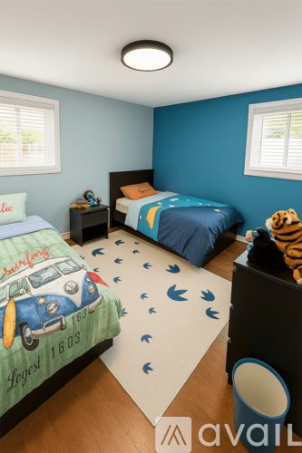 A bedroom with two beds and a rug with a car design on it.