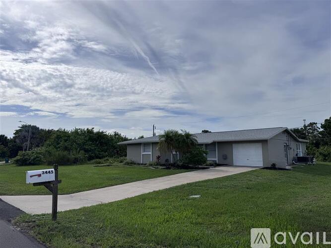 A house with a sign that says "3455" in front of it.