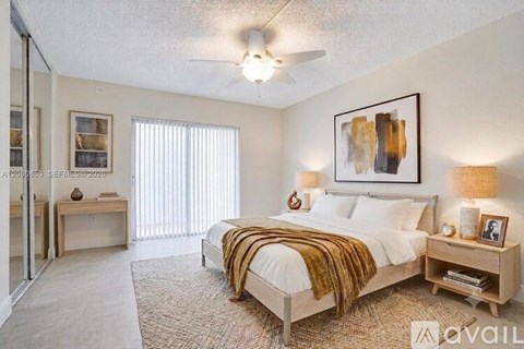 A bedroom with a bed, nightstand, and a painting on the wall.