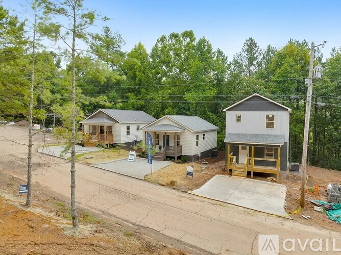 A house with a garage is available for sale.