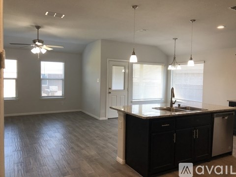 A kitchen with a counter and cabinets.