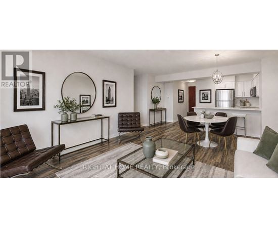 A living room with a brown leather couch and a glass coffee table.