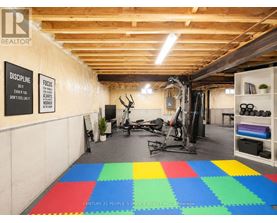 A gym with a sign that says "Discipline" on the wall.