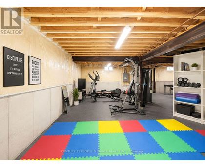 A gym with a sign that says "Discipline" on the wall.