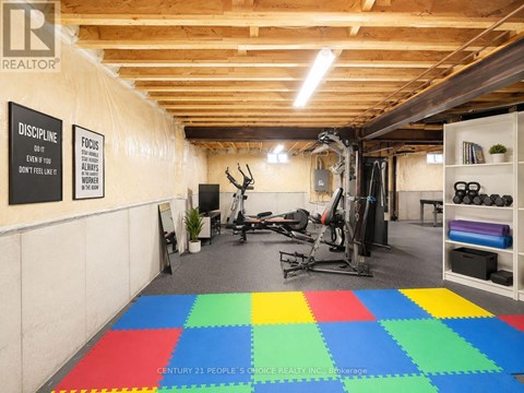 A gym with a sign that says "Discipline" on the wall.