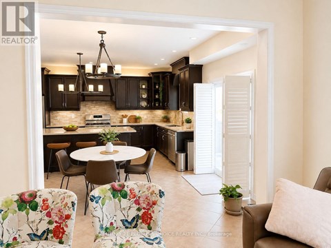 A modern kitchen with a dining table set up.