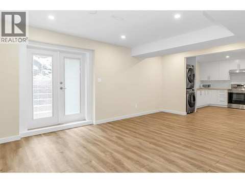 A realtor logo is on the top left corner of the image.