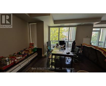 A room with a table and chairs in it.