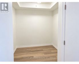 A brokerage room with a door on the right.