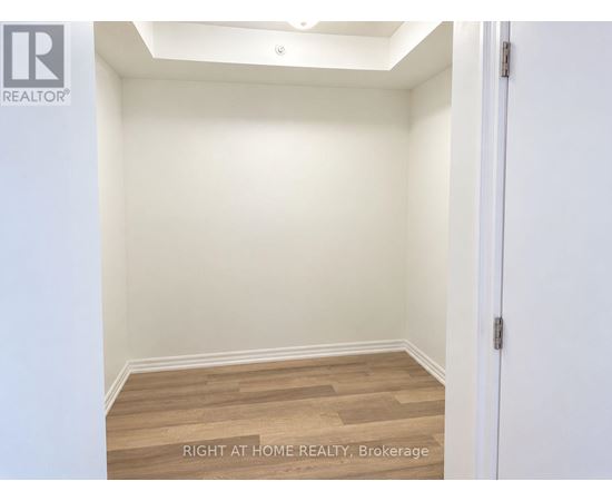 A brokerage room with a door on the right.