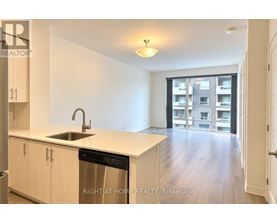 A kitchen with a dishwasher and a sink.