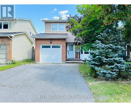 A house with a driveway in front of it.