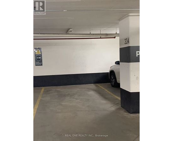 A car is parked in a parking garage.