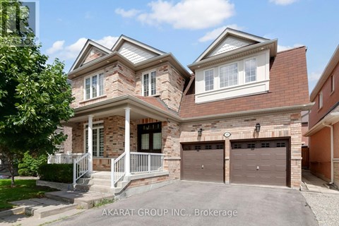 A two-story house with a garage is for sale by the Akarat Group Inc.