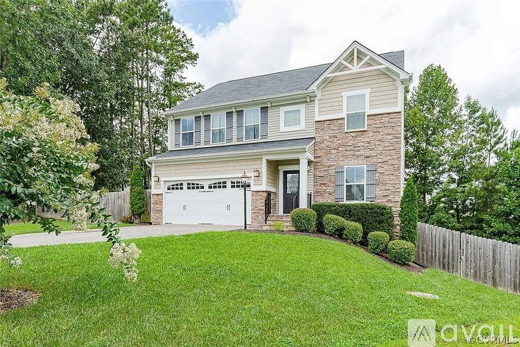 A house with a garage is available for sale.