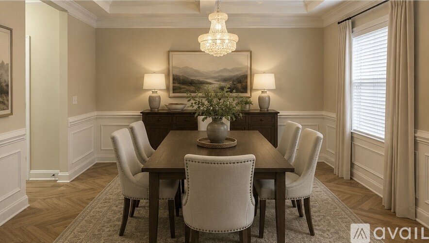 A dining room with a wooden table and chairs.