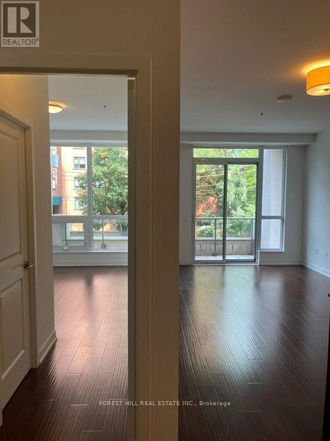 A realtor sign is on the door.