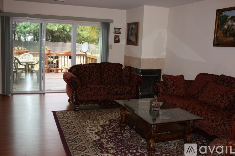 A living room with a couch and a coffee table.
