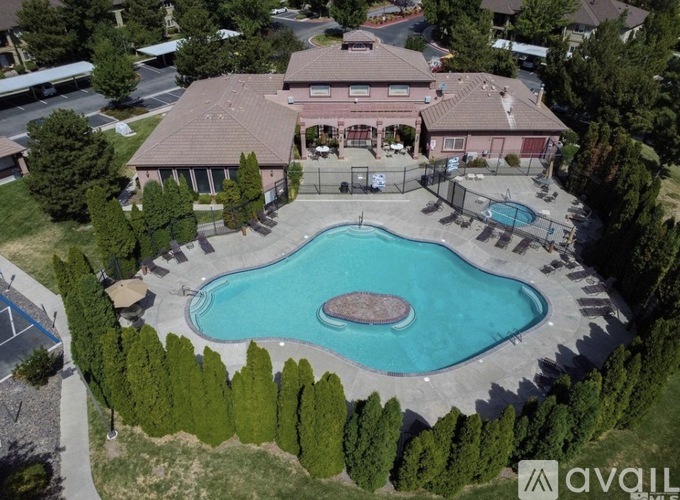A large house with a pool in the backyard.