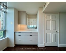 A white door is on the right side of the image.