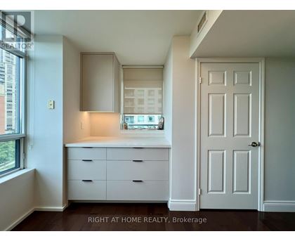 A white door is on the right side of the image.