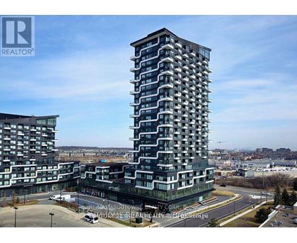A tall residential building with a balcony on the 10th floor.